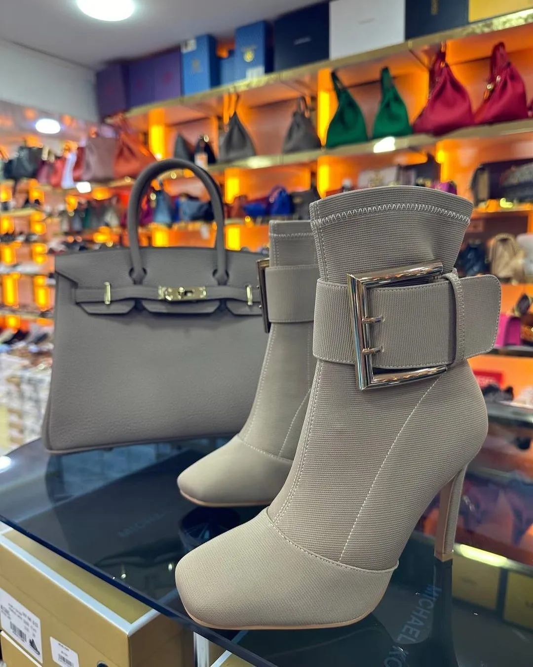 Gold buckle high heel nude boots